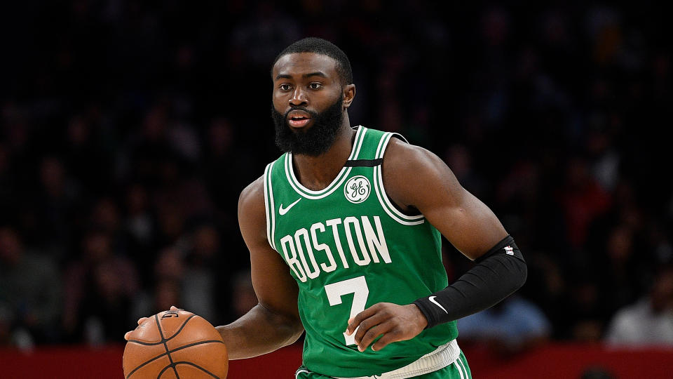 Boston Celtics guard Jaylen Brown (7) dribbles the ball during the second half of an NBA game against the Washington Wizards.
