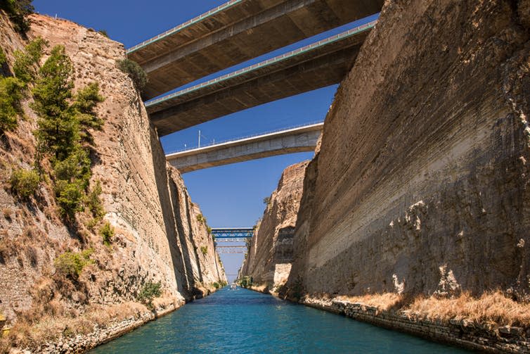 <span class="caption">The Corinth Canal in Greece connects the Gulf of Corinth with the Saronic Gulf in the Aegean Sea.</span> <span class="attribution"><a class="link " href="https://www.shutterstock.com/image-photo/passing-through-corinth-canal-by-yacht-1506495587?src=49b2a77a-3838-4680-89c2-112fe08a8d7e-1-12" rel="nofollow noopener" target="_blank" data-ylk="slk:Victoria Kurylo/Shutterstock;elm:context_link;itc:0;sec:content-canvas">Victoria Kurylo/Shutterstock</a></span>