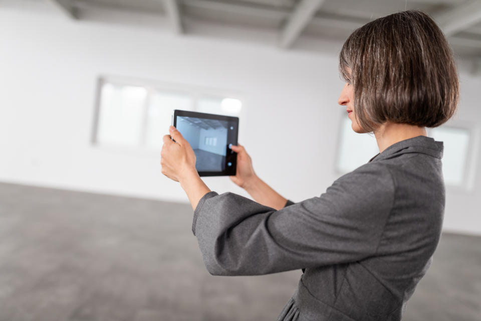 Female Architect In Modern Empty Office