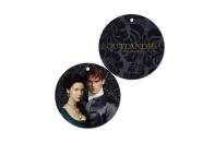 <p>Theirs is a love that transcends time, so ‘tis always the season for this timeless and beautiful ceramic disc featuring the Scottish maverick and his sassenach. <a rel="nofollow noopener" href="https://www.outlanderstore.com/products/outlander-jamie-and-claire-ornament" target="_blank" data-ylk="slk:Buy here;elm:context_link;itc:0;sec:content-canvas" class="link "><strong>Buy here</strong></a> </p>