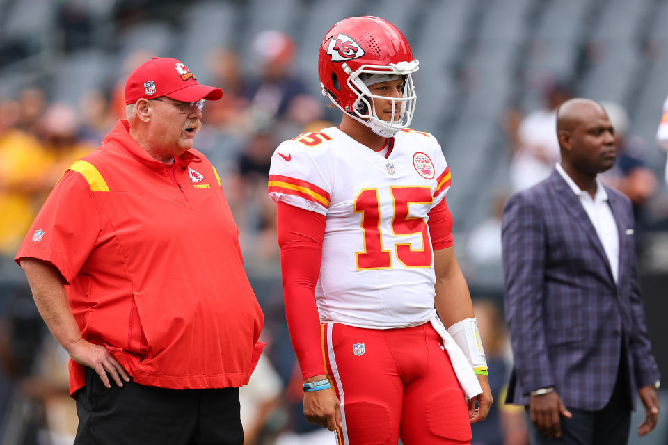 CHICAGO, ILLINOIS - AUGUST 13: Kansas City Chiefs head coach Andy Reid and Patrick Mahomes #15 talk prior to a preseason game against the Chicago Bears at Soldier Field on August 13, 2022 in Chicago, Illinois.  (Photo by Michael Reaves/Getty Images)