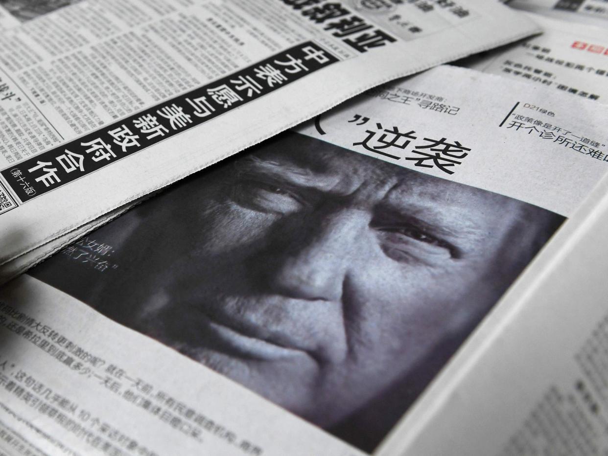 Donald Trmp on the front page of a Chinese newspaper in November: Getty