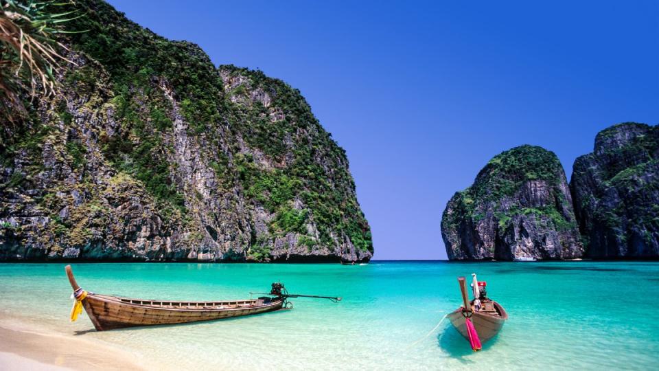 <p>Many people will recognise photos of Maya Bay. The images perfectly capture Thailand's clear blue waters, white beaches and luscious green rock formations. </p><p>However, the tourist hotspot, which was made even more famous by Leonardo DiCaprio's 2000 film <em>The Beach, </em>was forced to close in 2018. Thai authorities closed the beach in June to allow for the re-growth of the coral reefs and aquatic life, according to the <em><a rel="nofollow noopener" href="https://www.theguardian.com/film/2018/mar/28/thailand-beach-leonardo-dicaprio-closing" target="_blank" data-ylk="slk:Guardian;elm:context_link;itc:0;sec:content-canvas" class="link ">Guardian</a></em>.</p>