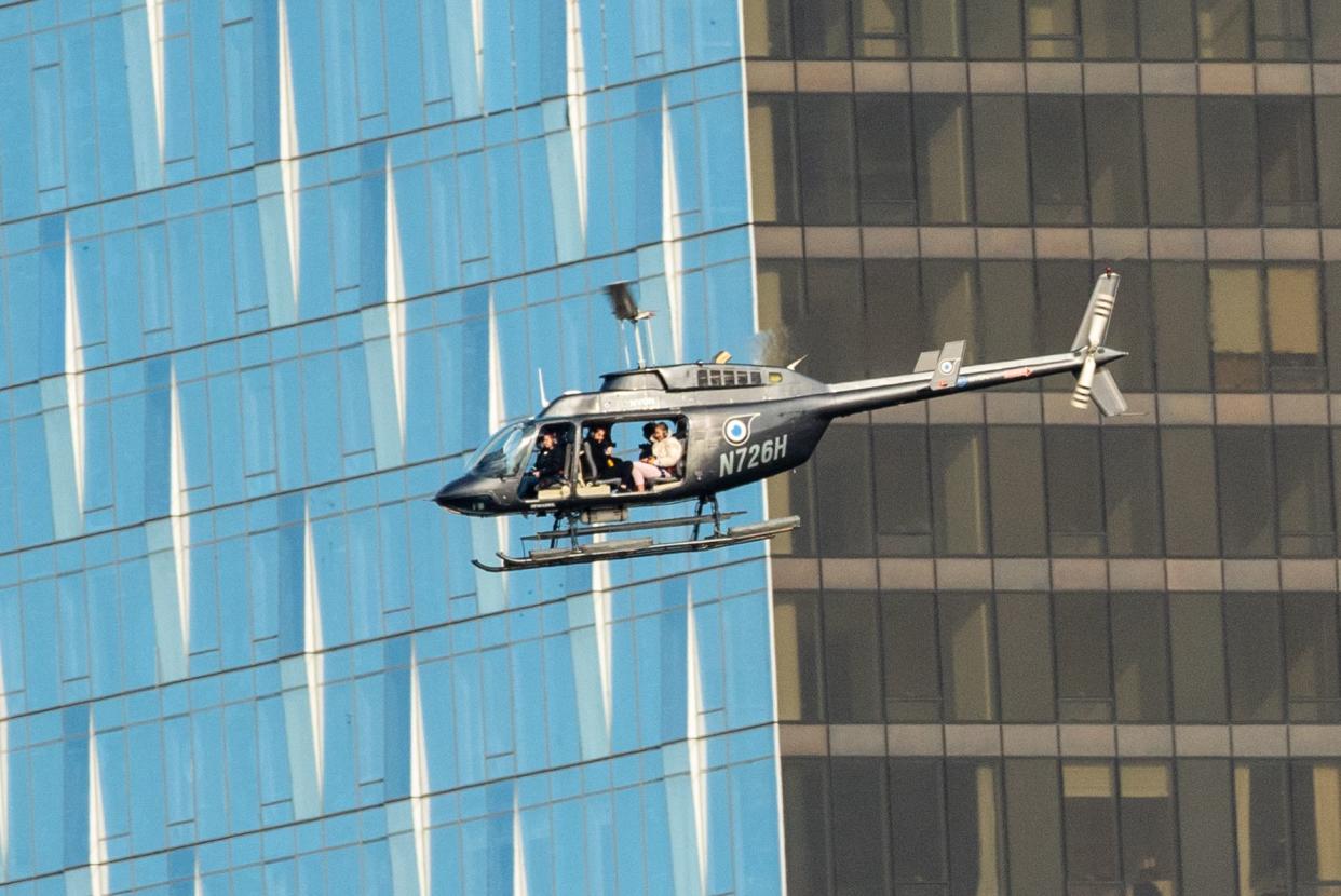 Views of Helicopter conducting ‘Doors Off’ flights in lower Manhattan as seen from Adams Street in Brooklyn on Sunday January 12, 2020. 1034. (Theodore Parisienne for New York Daily News)