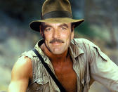 <b>Tom Selleck as Indiana Jones in 'Raiders of the Lost Ark' (1981)</b> Thank goodness Kurt Russell didn't steal Harrison's part as Han Solo in 'Star Wars' because it was this performance that impressed Indiana Jones producers enough to offer him the lead part. But not before they had originally offered the role to none other than 80s TV star and moustache fan Tom Selleck. Sadly for Selleck he was committed to his TV show 'Magnum P.I.' and couldn't take them time out to shoot 'Raiders' which is when Steven Spielberg thought of Harrison Ford. Unluckily for Selleck, 'Raiders of the Lost Ark' would go on to be nominated for 9 Academy Awards and become one of the highest grossing films of the 80s. Harrison Ford would become a bona fide movie legend, and poor Tom Selleck would languish in TV land.