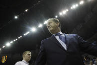 Kentucky head coach John Calipari walks off the court after the first half of the South Regional final game in the NCAA college basketball tournament against North Carolina, Sunday, March 26, 2017, in Memphis, Tenn. (AP Photo/Mark Humphrey)