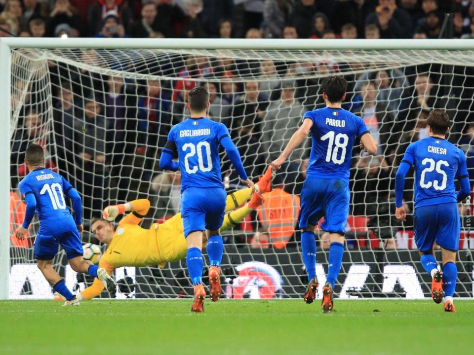 Lorenzo Insigne drew the Italians level from the penalty spot (Getty)