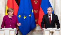 Russian President Putin and German Chancellor Merkel hold a joint news conference in Moscow