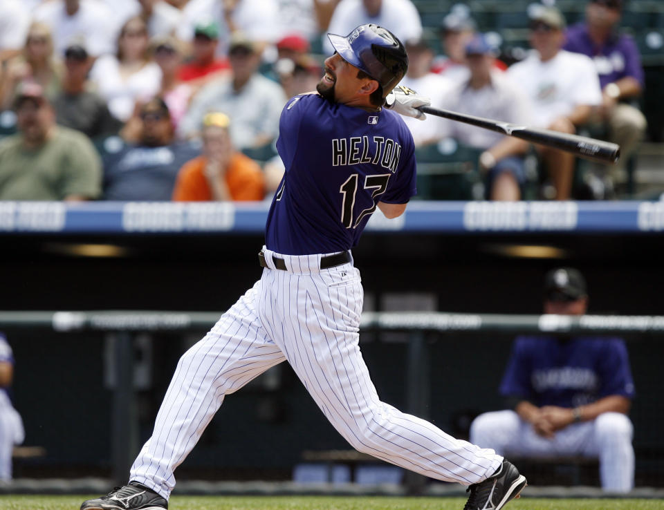 FILE - Colorado Rockies' Todd Helton swings at a pitch from Chicago Cubs starting pitcher Sean Marshall in the first inning of a Major League baseball game in Denver on Sunday, Aug. 12, 2007. Helton, Billy Wagner and Scott Rolen are leading contenders to be elected to baseball's Hall of Fame in the Baseball Writers' Association of America vote announced Tuesday, Jan. 24, 2023. (AP Photo/David Zalubowski, File)