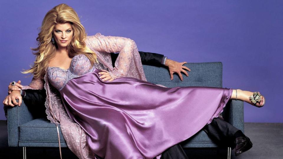 Kirstie Alley laying on a man