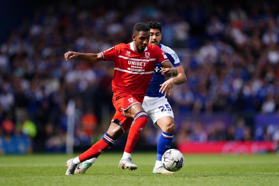 Isaiah Jones dribbles past Ipswich midfielder Massimo Luongo <i>(Image: PA)</i>