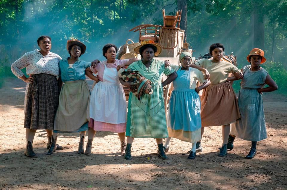 This image released by Warner Bros. Pictures shows Danielle Brooks, center, in a scene from "The Color Purple." (Warner Bros. Pictures via AP) ORG XMIT: NYET624