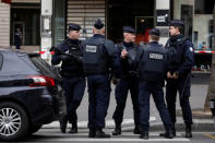 French police stand in front of the French financial prosecutor's offices following a bomb alert in central Paris, France, March 20, 2017. REUTERS/Benoit Tessier