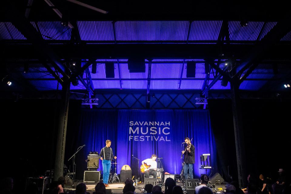 Jake Blount, Nic Gareiss and Laurel Premo perform at the Metal Building at Trustees' Garden on Friday, April 7, as part of the 2023 Savannah Music Festival.