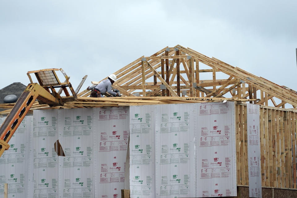 A new home under construction is shown Thursday, Sept. 24, 2020, in Houston. U.S. construction spending increased 1.4% in August, led by a surge in spending on single-family homes. (AP Photo/David J. Phillip)