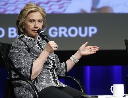 Former U.S. Secretary of State Hillary Clinton participates in an event on empowering woman and girls, at the World Bank in Washington in this May 14, 2014 file photo. REUTERS/Jonathan Ernst/Files