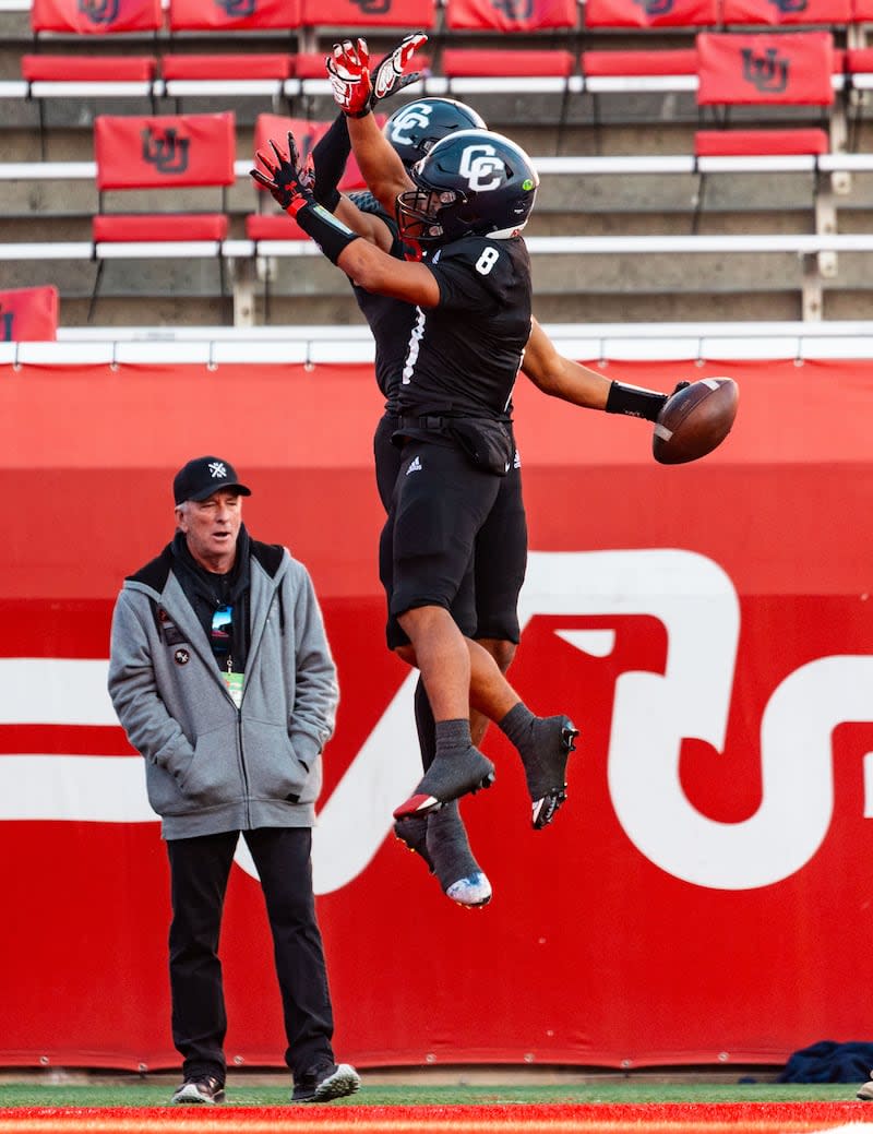 Corner Canyon High School's Chryshaun Lee, front, and Jerome Myles celebrate Myles' touchdown during the 6A state football championship game against Skyridge High School at Rice-Eccles Stadium in Salt Lake City on Friday, Nov. 17, 2023. |  Megan Nielsen, Deseret News