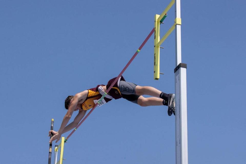 Bourbon County’s Tayvon Snowden competes in the pole vault during the Class 2A state championships at the University of Kentucky Track and Field Facility on Friday.