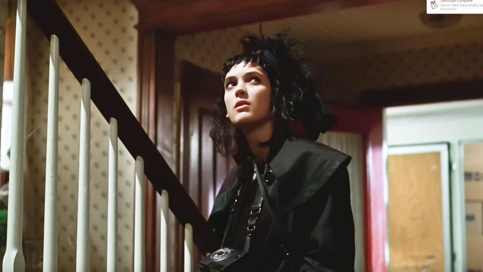 USA. Winona Ryder   in a scene from ©Warner Bros film: Beetlejuice (1988). Plot: The spirits of a deceased couple are harassed by an unbearable family that has moved into their home, and hire a malicious spirit to drive them out.  Ref: LMK110-J6576-090620 Supplied by LMKMEDIA. Editorial Only. Landmark Media is not the copyright owner of these Film or TV stills but provides a service only for recognised Media outlets. pictures@lmkmedia.com