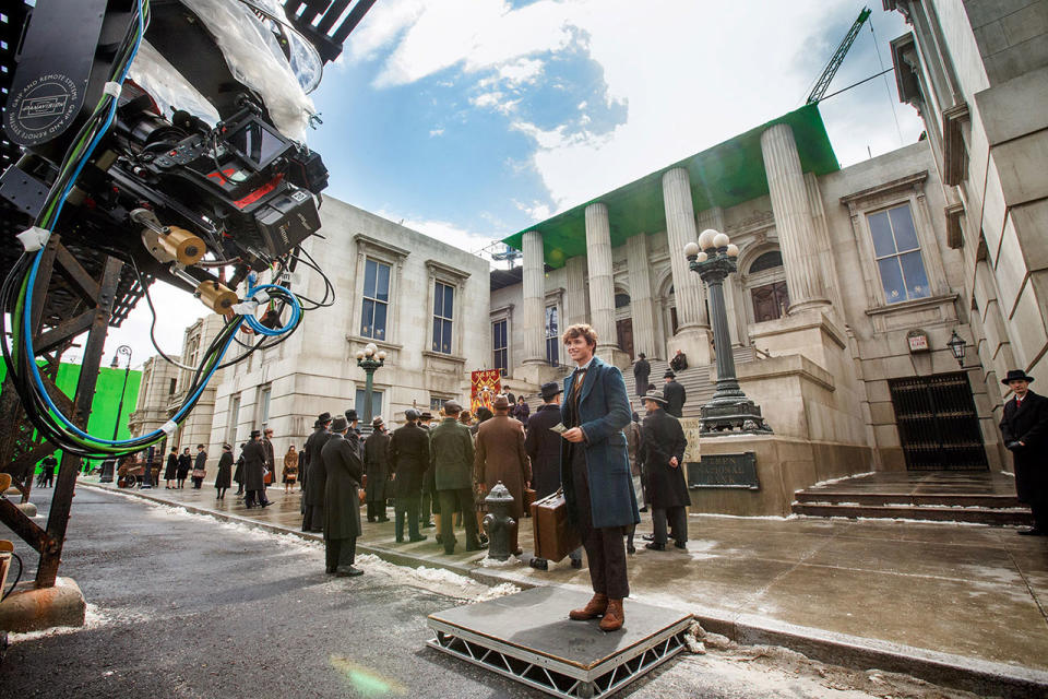 Eddie Redmayne on the huge Leavesden set of 'Fantastic Beasts' - Credit: Warner Bros.