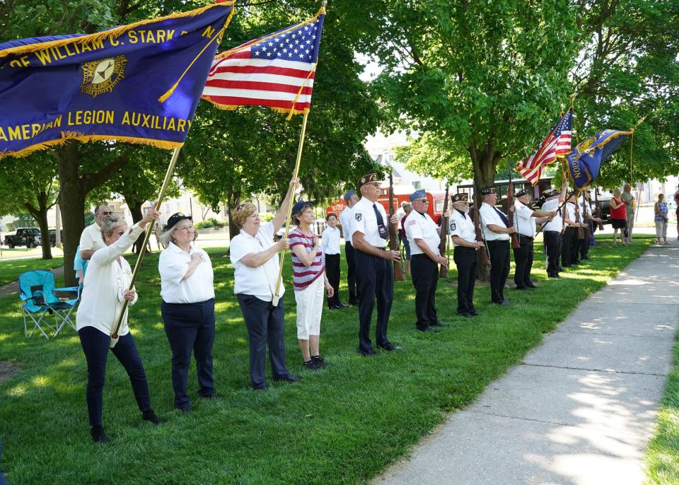 Members of veterans posts and their auxiliaries present the colors during the 2022 Memorial Day ceremony Monday at Monument Park in Adrian.