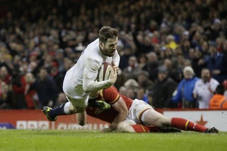 Britain Rugby Union - Wales v England - Six Nations Championship - Principality Stadium, Cardiff - 11/2/17 England's Elliot Daly scores a try Action Images via Reuters / Henry Browne