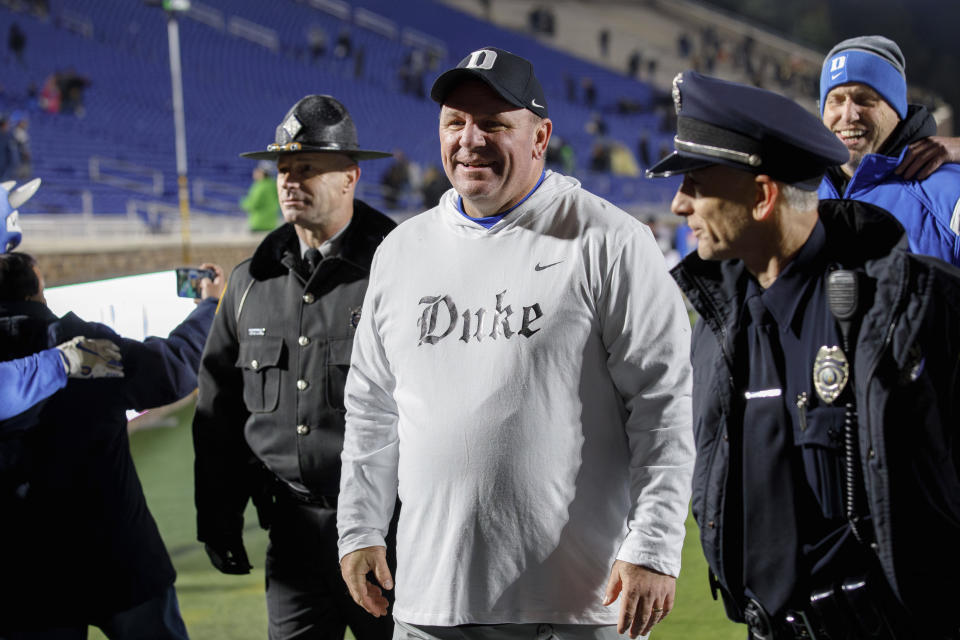 Duke coach Mike Elko walks off the field after after the team's win over Wake Forest in an NCAA college football game in Durham, N.C., Thursday, Nov. 2, 2023. (AP Photo/Ben McKeown)