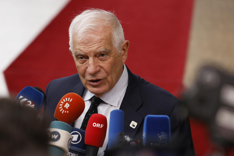 European Union foreign policy chief Josep Borrell speaks with the media as he arrives for an EU Summit in Brussels, Thursday, March 21, 2024. European Union leaders are gathering to consider new ways to help boost arms and ammunition production for Ukraine. Leaders will also discuss in Thursday's summit the war in Gaza amid deep concern about Israeli plans to launch a ground offensive in the city of Rafah. (AP Photo/Omar Havana)