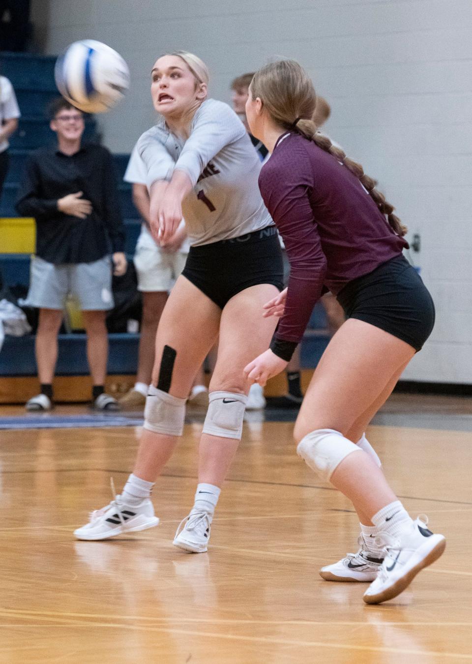 Navarre High School's Addison Danforth (No. 7) digs a Gulf Breeze serve during Wednesday's Region 1-6A quarterfinals match against the Dolphins. Navarre dropped three straight to Gulf Breeze 25-20, 25-18, 25-16.