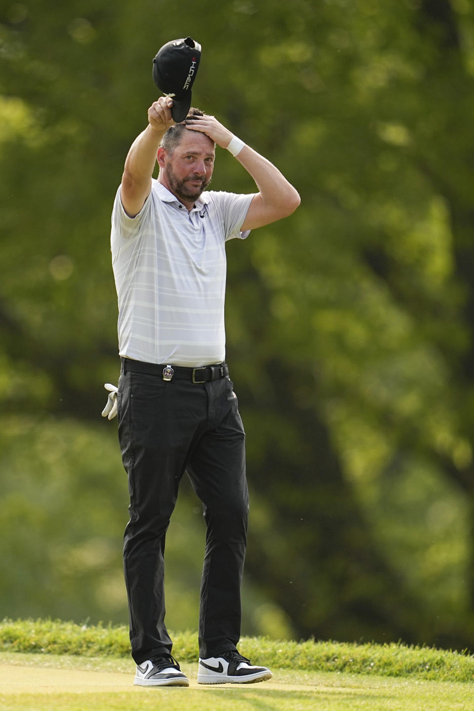 Michael Block celebrates after his hole-in-one on the 15th hole during the final round of the PGA Championship golf tournament at Oak Hill Country Club on Sunday, May 21, 2023, in Pittsford, N.Y. (AP Photo/Abbie Parr)