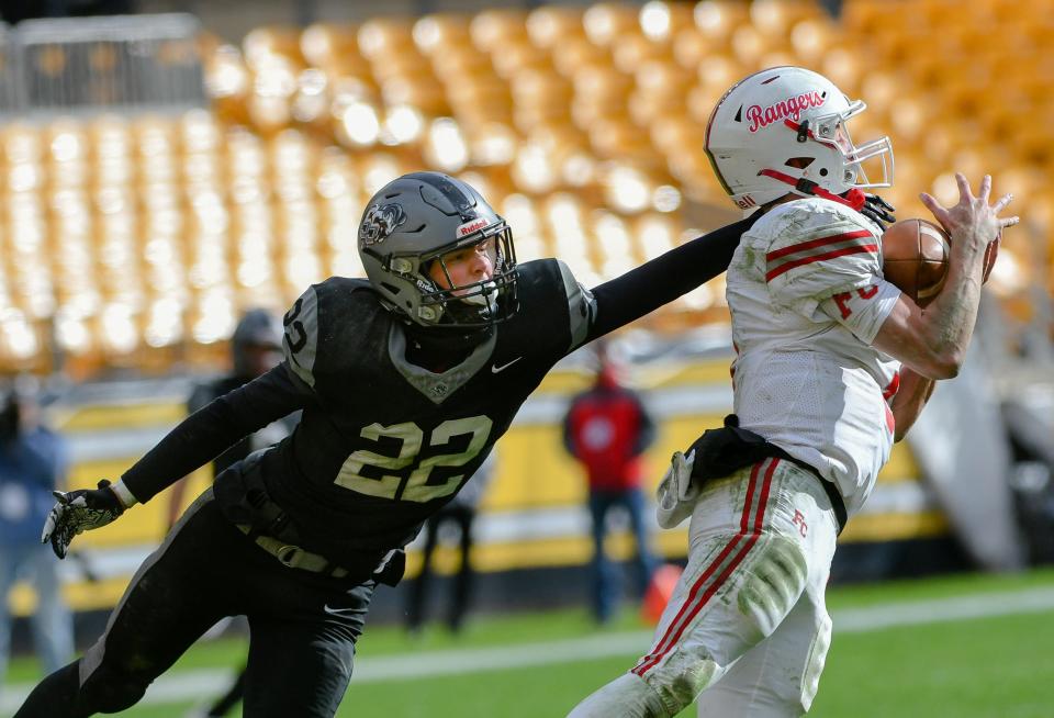 Fort Cherry's Matt Sieg intercepts a pass in front of South Side's Andrew Corfield during Friday's Class 1A WPIAL championship game at Acrisure Stadium in Pittsburgh.