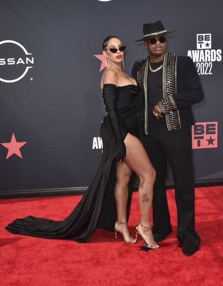 Ne-Yo and Crystal Renay arrive at the BET Awards in Los Angeles. (Photo by Richard Shotwell/Invision/AP)