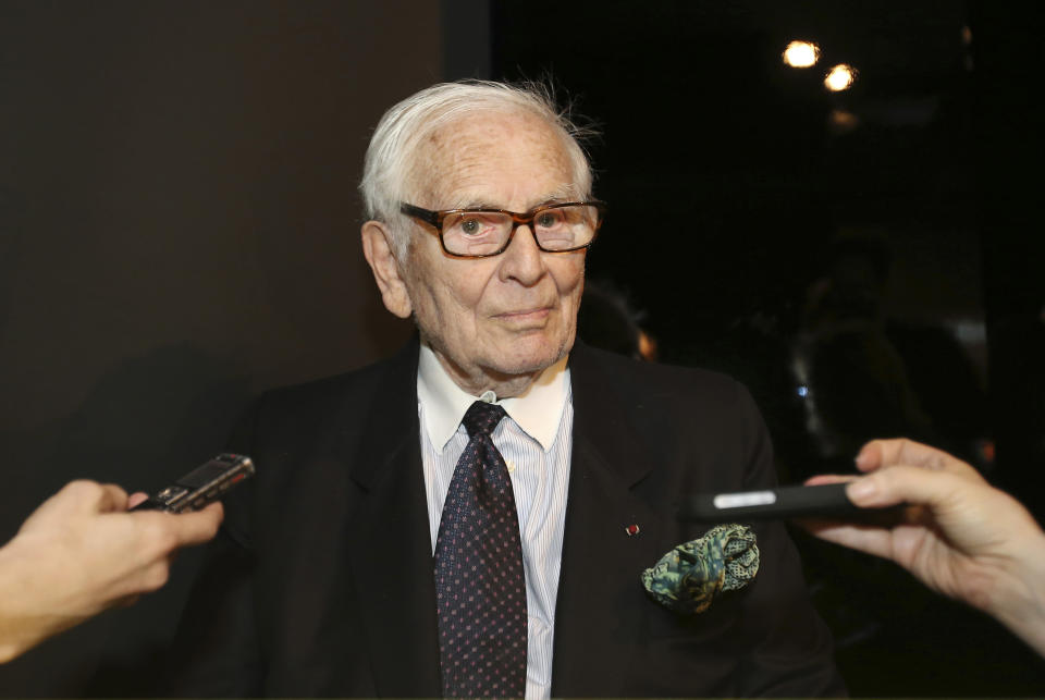 FILE - In this April 10, 2014 file photo, French designer Pierre Cardin listens media questions at the Milan Design Fair, in Milan, Italy. France's Academy of Fine Arts says Pierre Cardin, the French designer whose Space Age style was among the iconic looks of 20th-century fashion, has died at 98. (AP Photo/Antonio Calanni, File)