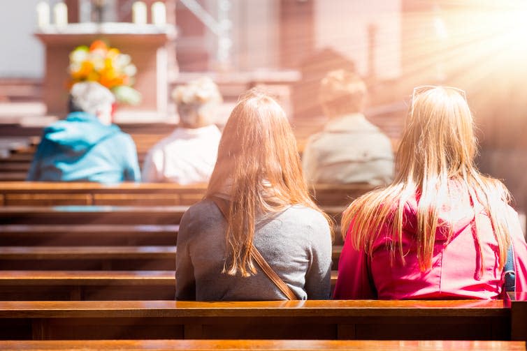 <span class="caption">Falling numbers of young Christians points to its incompatibility with socially liberal views.</span> <span class="attribution"><a class="link " href="https://www.shutterstock.com/image-photo/people-praying-church-434094589" rel="nofollow noopener" target="_blank" data-ylk="slk:muratart/Shutterstock;elm:context_link;itc:0;sec:content-canvas">muratart/Shutterstock</a></span>