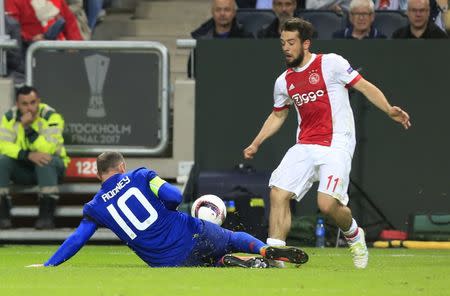 Football Soccer - Ajax Amsterdam v Manchester United - UEFA Europa League Final - Friends Arena, Solna, Stockholm, Sweden - 24/5/17 Ajax's Amin Younes in action with Manchester United's Wayne Rooney Reuters / Ints Kalnins Livepic