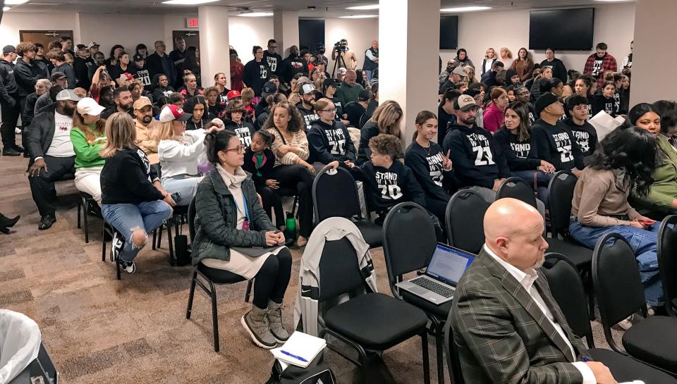 A crowd attends the Moore Public School board in support of fired Westmoore football coach Lorenzo Williams on Monday, Dec. 11, 2023, in Moore, Okla.
