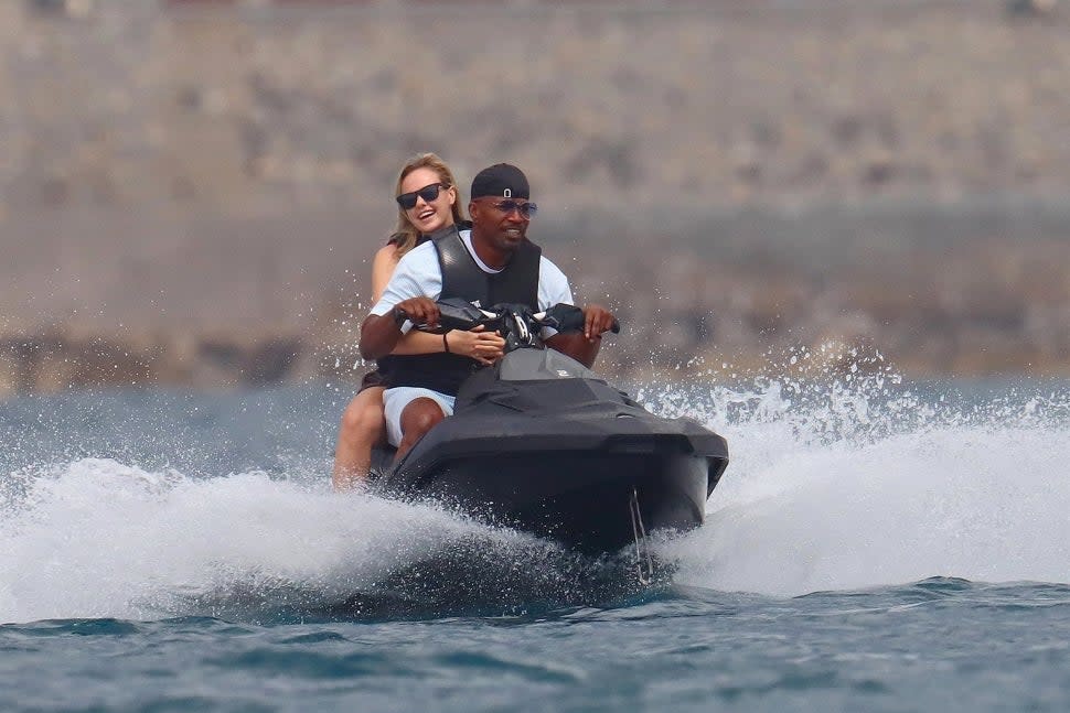 Jamie Foxx with woman in France on jet ski