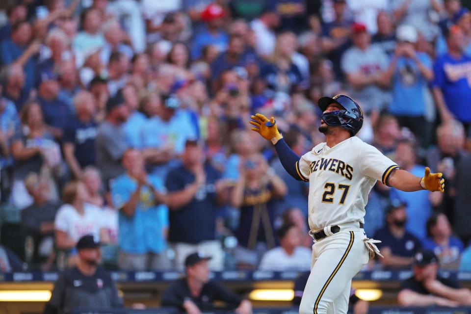 Willy Adames of the Milwaukee Brewers celebrates a two run home run against the Minnesota Twins.