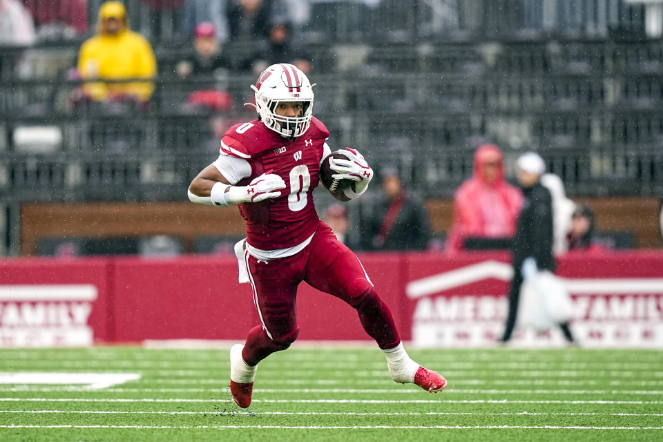 Wisconsin running back Braelon Allen (0) runs during the first half of an NCAA college football game against Maryland, Saturday, Nov. 5, 2022, in Madison, Wis. (AP Photo/Andy Manis)