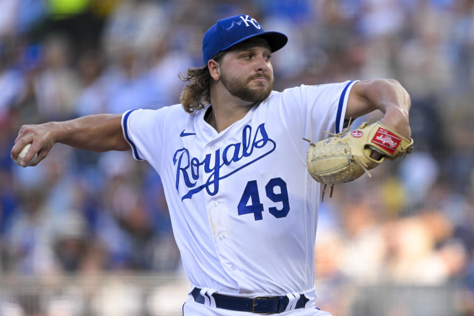 Kansas City Royals starting pitcher Jonathan Heasley throws to a Texas Rangers batter during the first inning of a baseball game Tuesday, June 28, 2022, in Kansas City, Mo. (AP Photo/Reed Hoffmann)