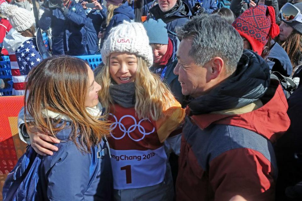 Chloe Kim (center) with parents