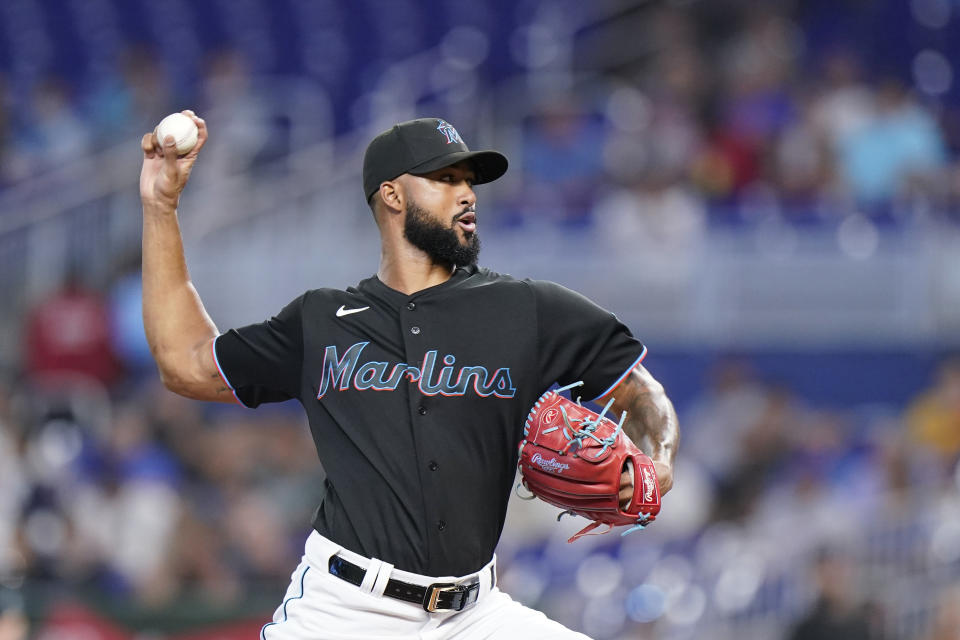 Miami Marlins' Sandy Alcantara delivers a pitch during the first inning of a baseball game against the New York Mets, Friday, July 29, 2022, in Miami. (AP Photo/Wilfredo Lee)