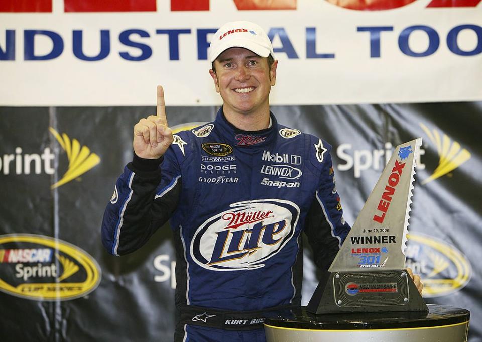 LOUDON, NH - JUNE 29: Kurt Busch driver of the #2 Miller Lite Dodge celebrates in Victory Lane after winning the NASCAR Sprint Cup Series LENOX Industrial Tools 301 at New Hampshire Motor Speedway on June 29, 2008 in Loudon, New Hampshire. (Photo by Jerry Markland/Getty Images for NASCAR)