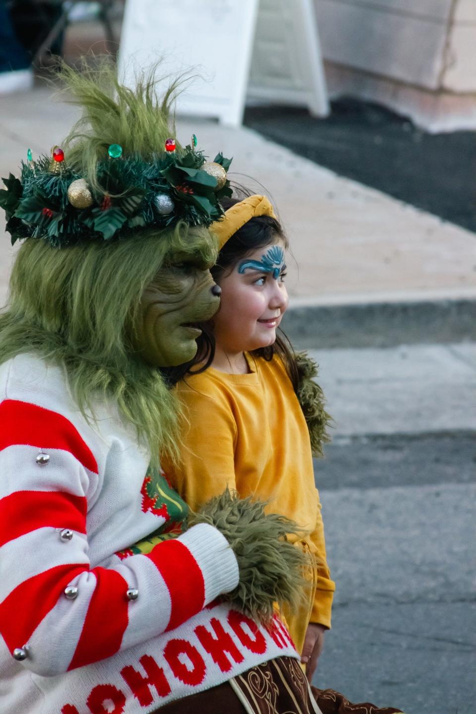The Grinch greets guests at a previous Thanksmas Market and Holiday Celebration in downtown Fall River.