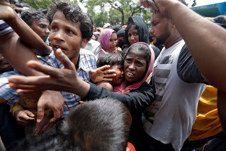 Rohingya refugees struggle to receive aid in Cox's Bazar, Bangladesh, September 23, 2017. REUTERS/Cathal McNaughton