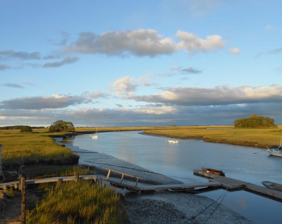 The Rowley River in Rowley, Mass., at low tide in the Great Marsh. Marshes are critical for recreational and commercial activities such as clamming, fishing, boating and birding. David S. Johnson