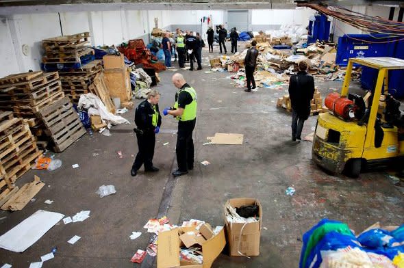 The police raid at one of the recycling plants.