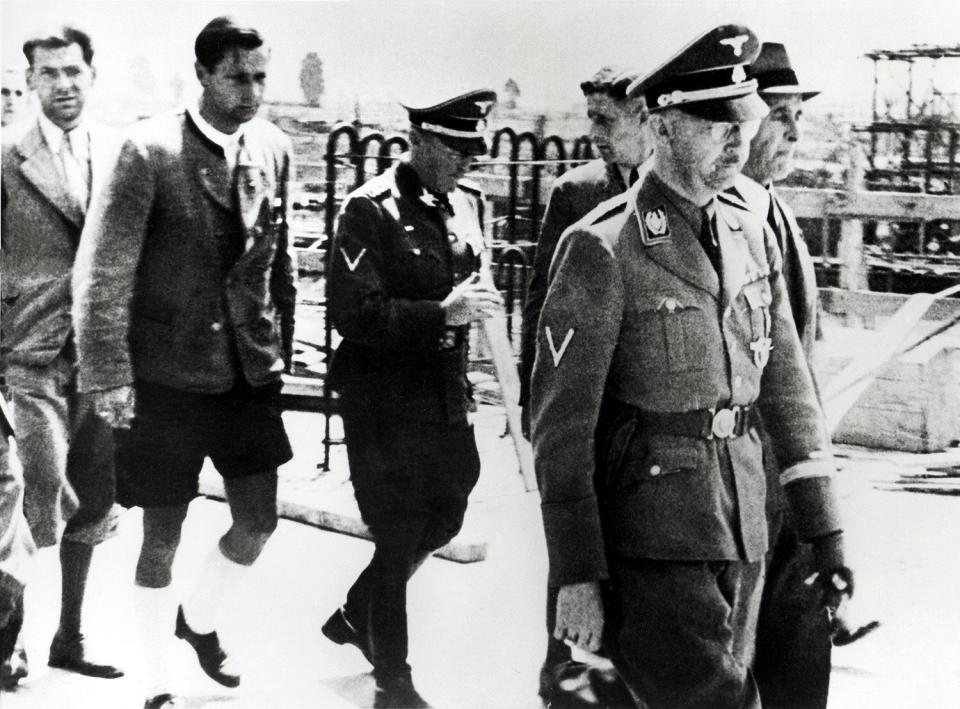 SS Heinrich Himmler and Chief Engineer Max Faust during Himmler's visit to Auschwitz in July 1942. 