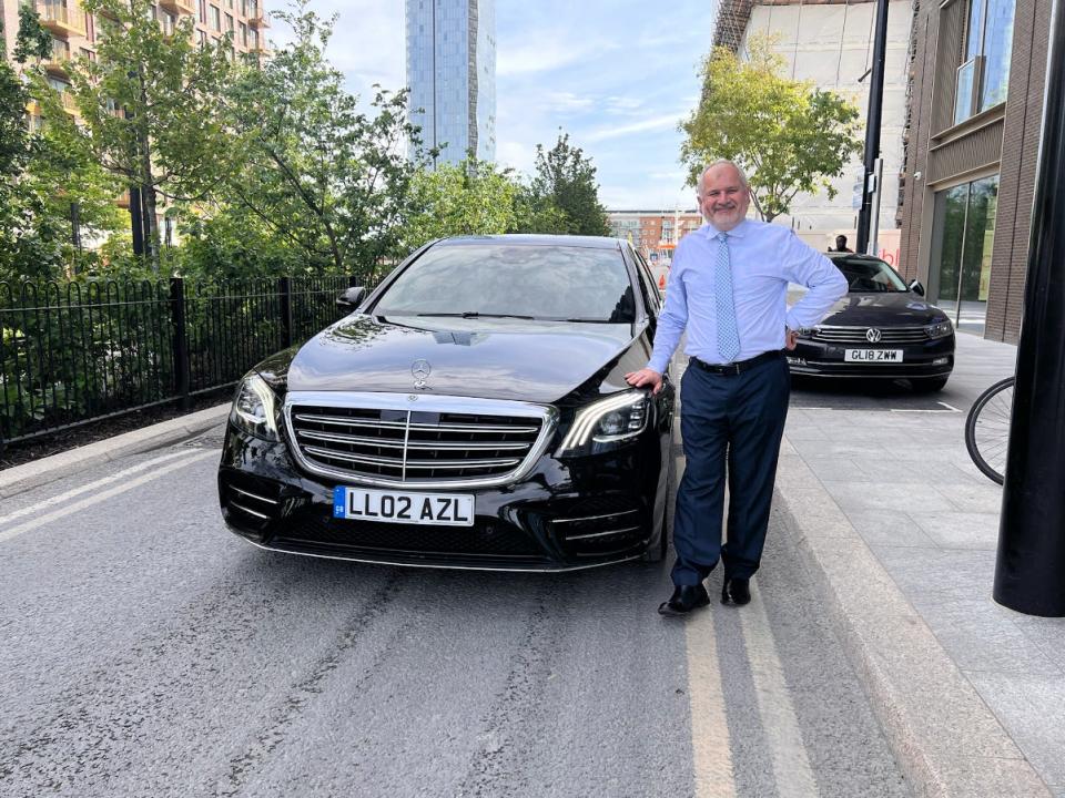 A view of the chauffeur with his Mercedes S Class