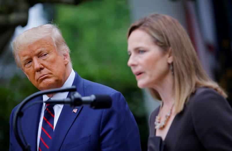 FILE PHOTO: U.S President Donald Trump holds an event to announce his nominee of U.S. Court of Appeals for the Seventh Circuit Judge Amy Coney Barrett to fill the Supreme Court seat